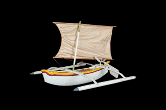 A type of sailing boat on a black background