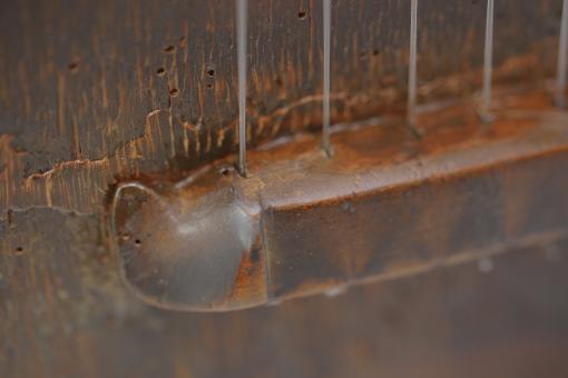 Detail of a small guitar-like instrument