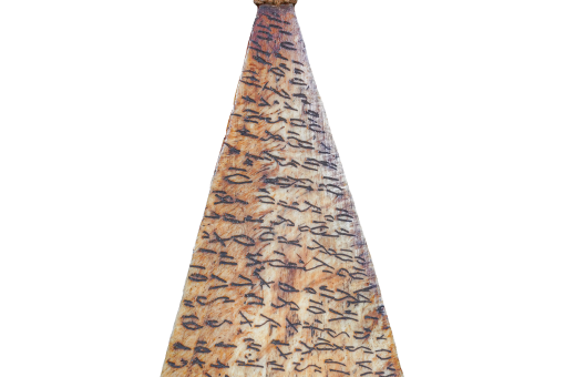 A triangular amulet with various images etched into its surface