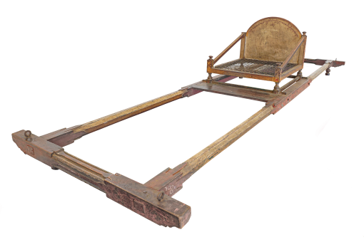 A form of transport made of teak wood, rattan, and metal, this Gayot is decorated with prominent floral and vine ornaments with dominant colours of red and gold