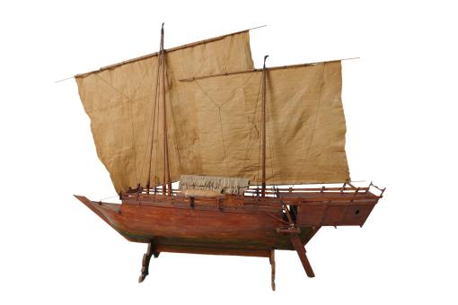 A miniature wooden sail boat